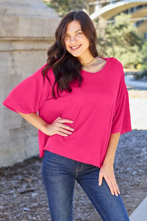 Round neck drop shoulder t shirt in white on hanger